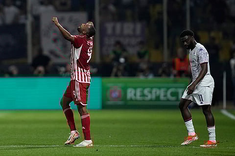 Ayoub El Kaabi celebrates after scoring